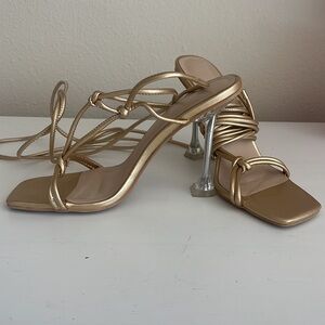 gold strappy clear heels